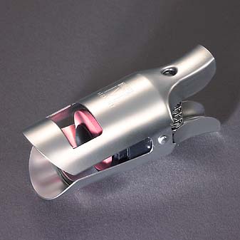 Sektverschluß Damit es auch am nächsten Tag noch prickelt.