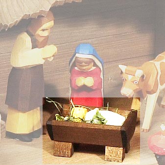  Zweiteilig mit Krippe und Christkind.